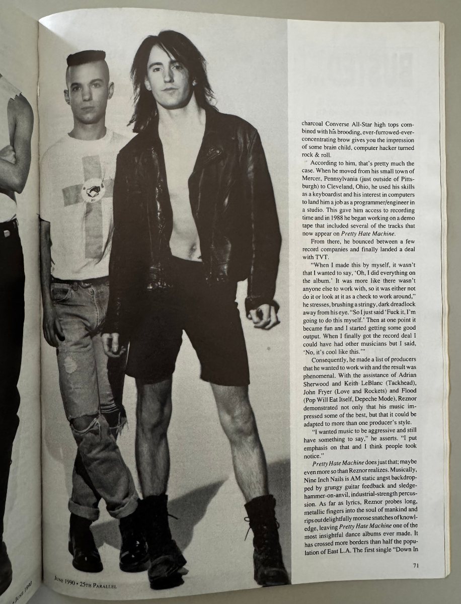 Continuation of the Nine Inch Nails feature, with a full-page band photograph and accompanying text.