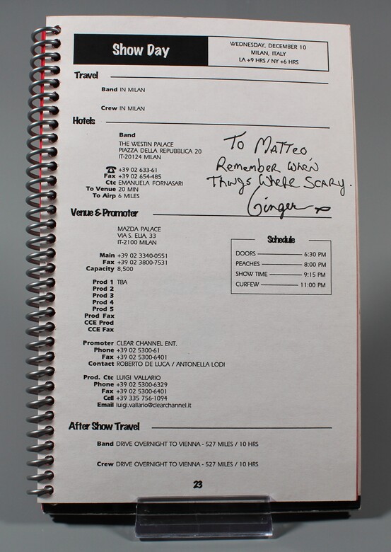 Show-day page for the 10 December 2003 concert in Milan, with a handwritten dedication by Ginger Fish