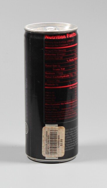 Reverse of an Eat Me, Drink Me energy drink can showing the nutrition information and original retail price sticker.